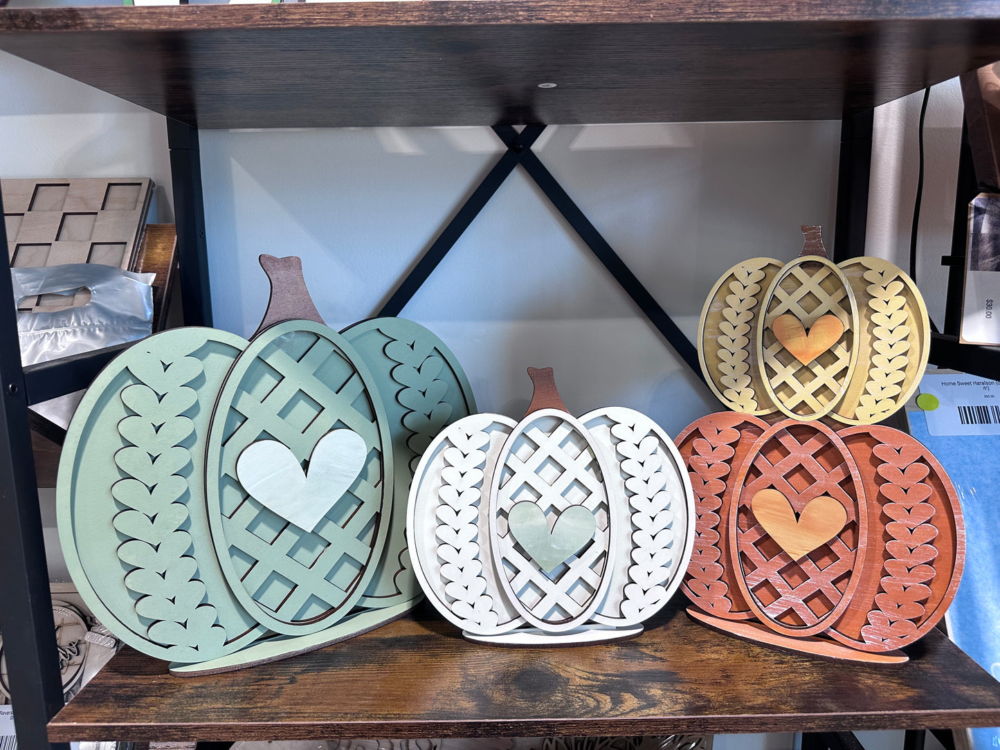 Paintable pumpkin decor that has a knit sweater pattern. Paint it yourself at Teal Barn Company in Bremen, GA