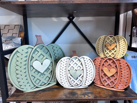 Paintable pumpkin decor that has a knit sweater pattern. Paint it yourself at Teal Barn Company in Bremen, GA