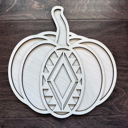 Wooden pumpkin decoration with geometric cutout