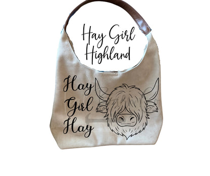 burn your own highland cow design into a suede bag